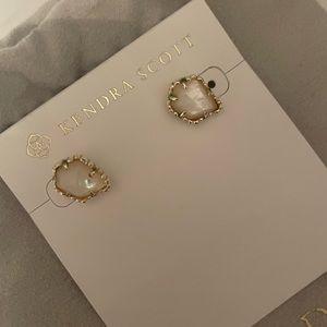 Kendra Scott Tessa stud earrings with jewelry bag. White mother of pearl